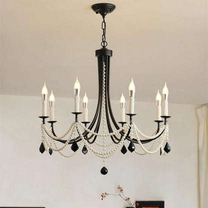 Decorative chandelier with candles in a room setting
