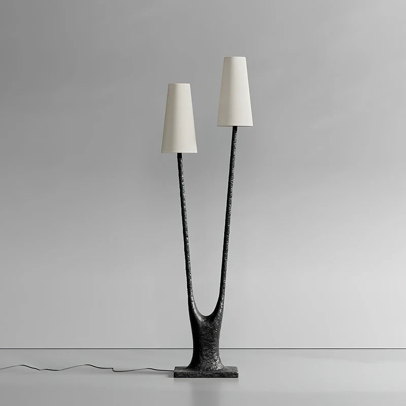 Modern floor lamp with unique design on a gray background