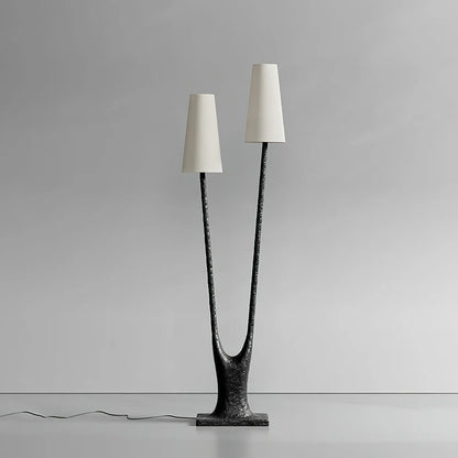 Modern floor lamp with unique design on a gray background